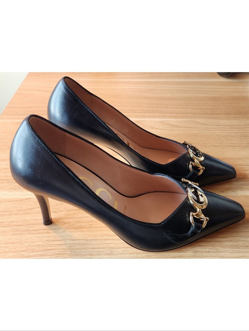 Gucci Elegant Black Heels with Gold/Silver Logo